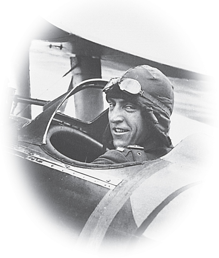 Photo: a pilot wearing a leather helmet.