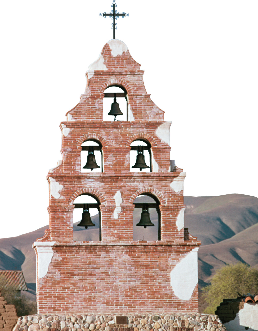 photo: a mission tower with 5 bells and a cross on top.