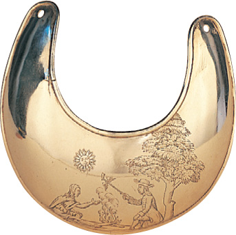 An engraved silver collar.