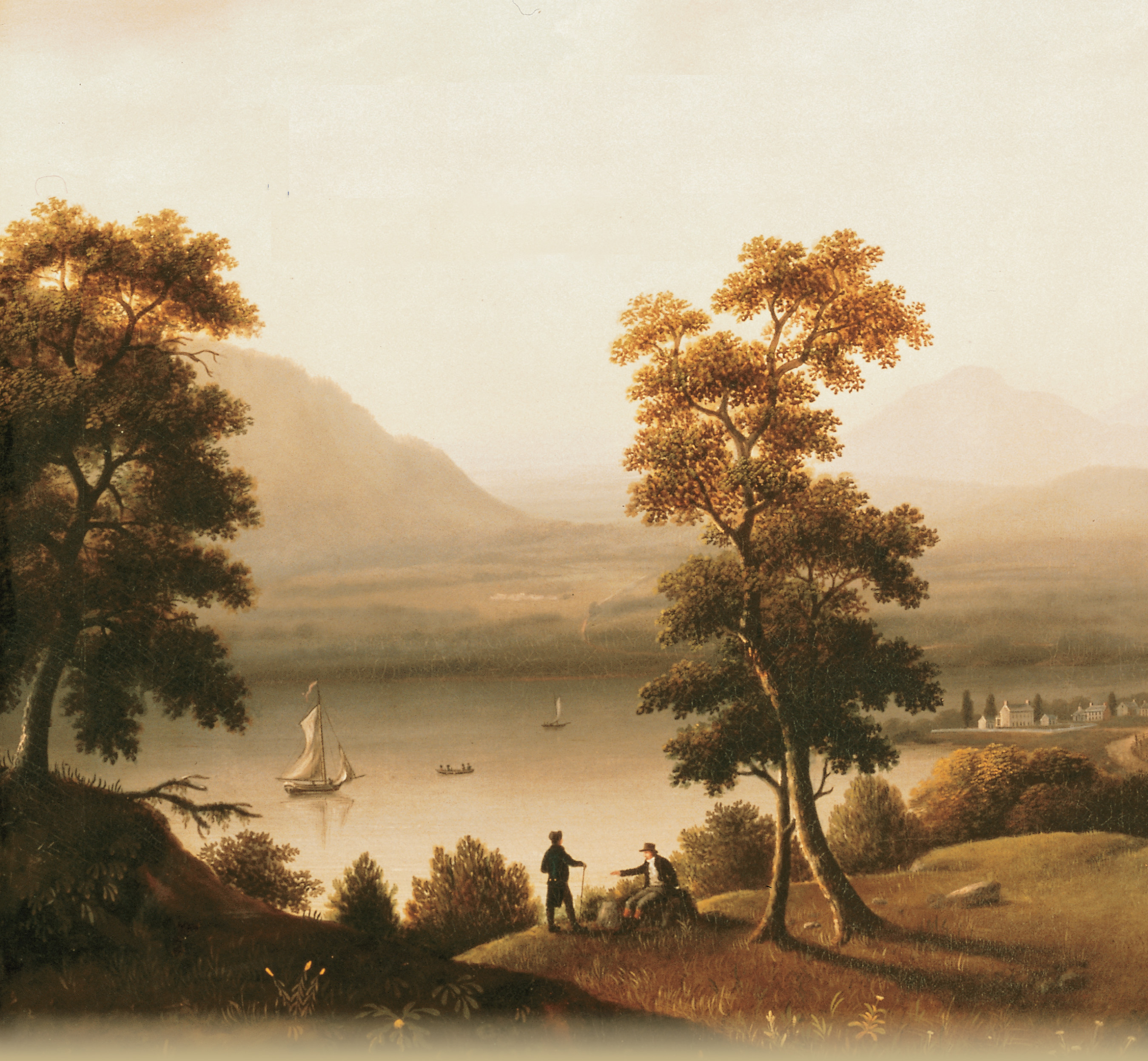 A painting shows a misty lake
surrounded by trees and mountains.