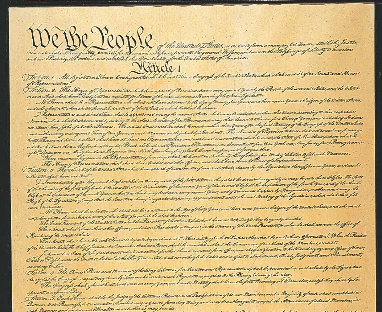 A photo of the original handwritten U.S. Constitution document.