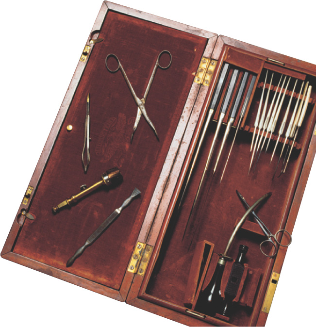 A photo of a surgeon's tools in a wooden case.