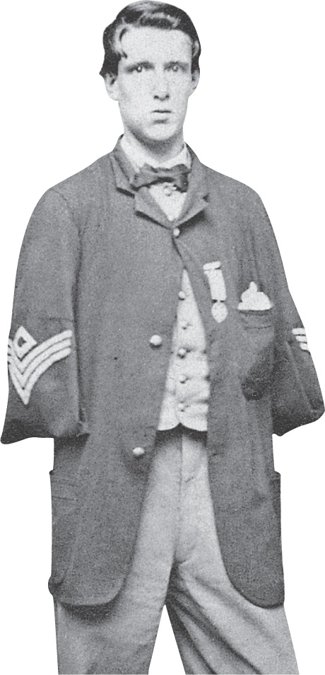 A photo: a man with is arms amputated wears a military coat with the sleeves buttoned in half.