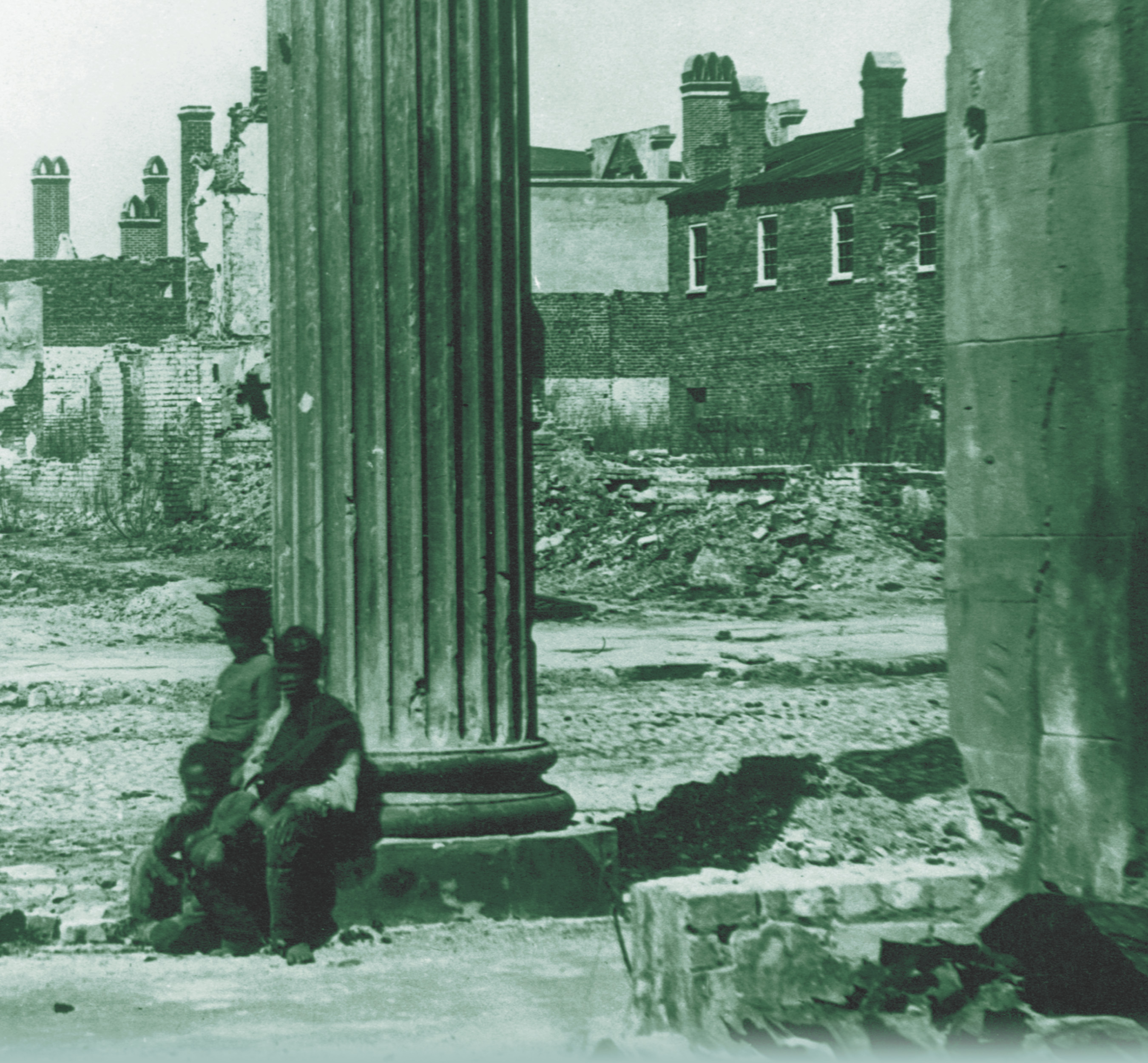 A photo shows African-American children leaning against a plantation house's column, near battered, crumbling buildings. A title: Chapter 12, Reconstruction and its Effects.