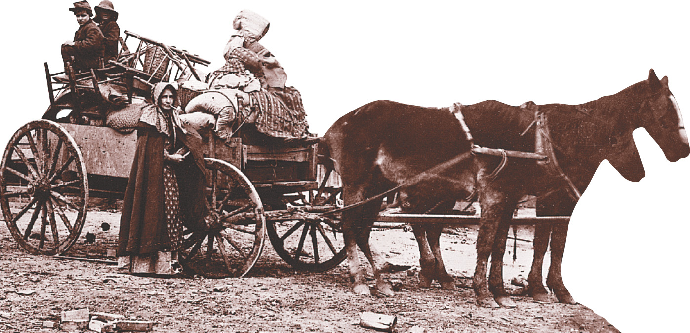 A white family sits in an open wagon loaded with furniture and possessions.
