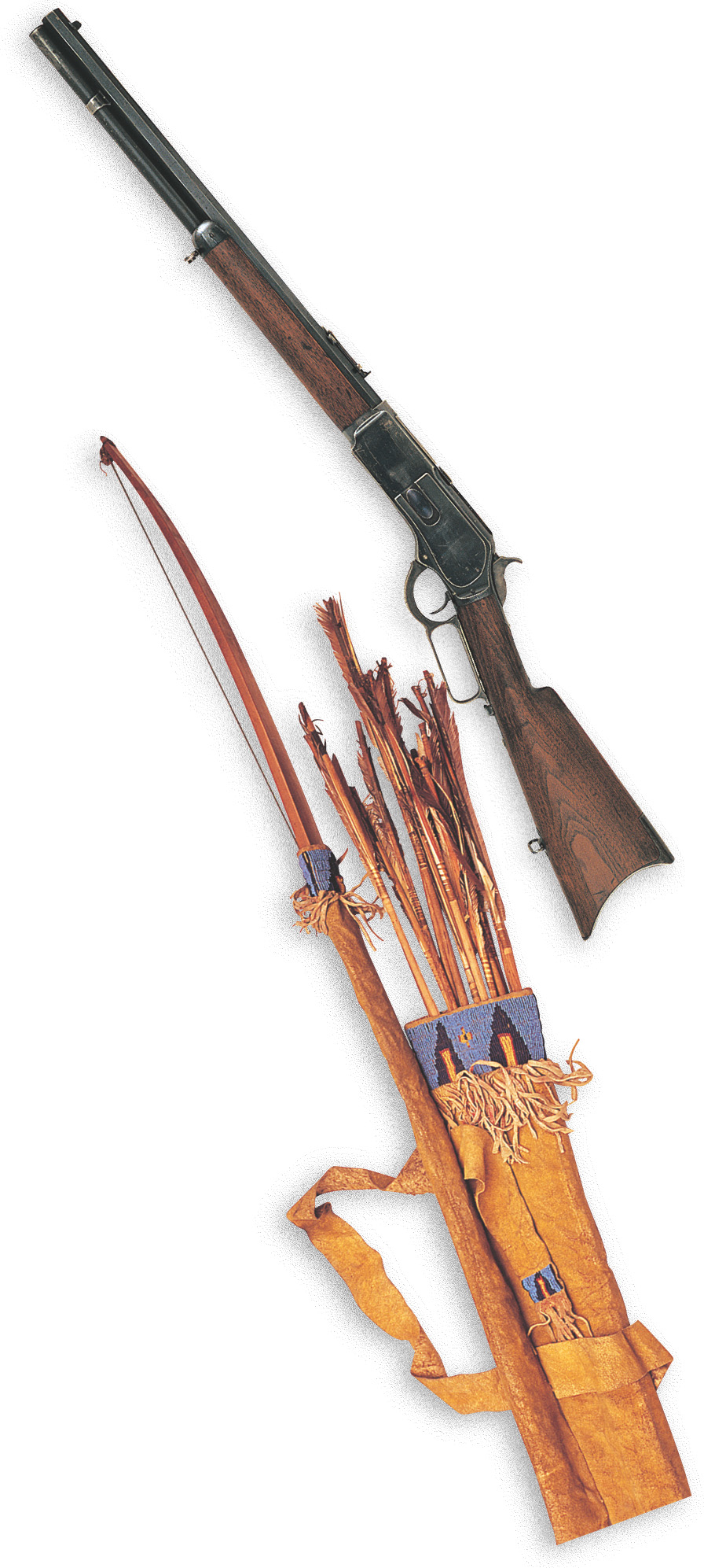 A photo of a Winchester rifle and a Native American bow with a quiver of arrows.