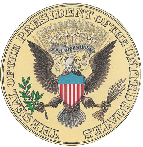 An eagle holds arrows in its talons in the logo of the U.S. presidential seal. The motto reads E Pluribus Unum.