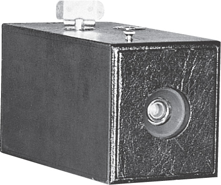 A photo: an early camera.