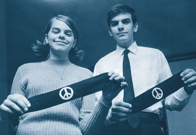 Photo: Mary Beth and John Tinker's armbands display a peace-symbol