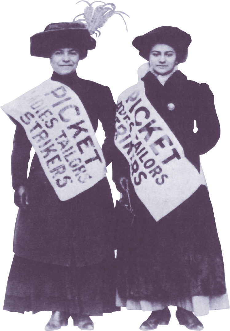 Photo: two women wear picket-sign banners.