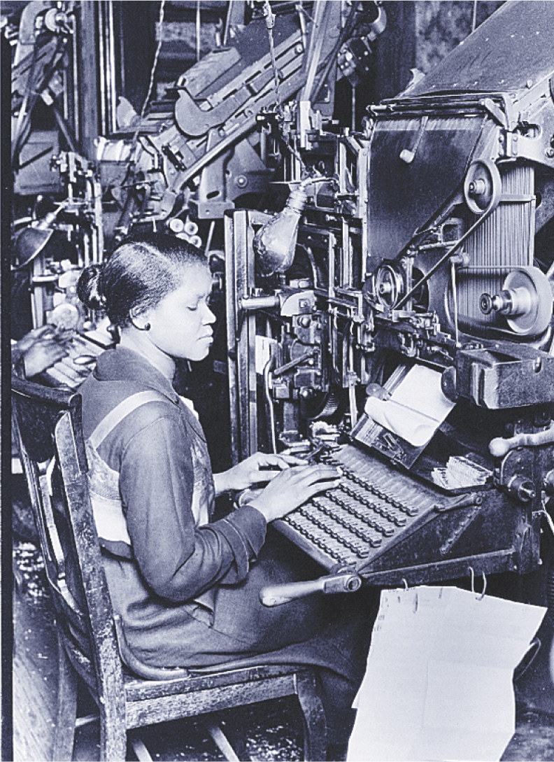 Photo: A woman works on a typesetting machine