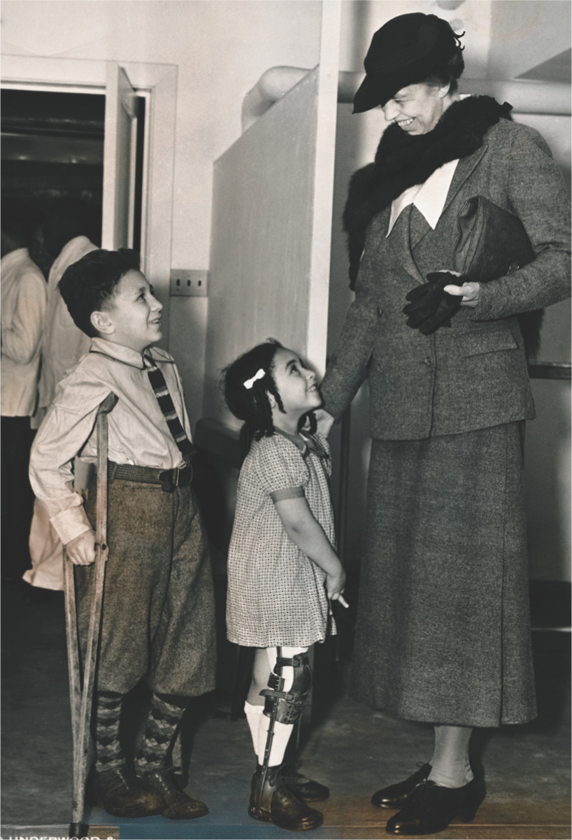Photo: Eleanor Roosevelt with children with crutches and leg-braces