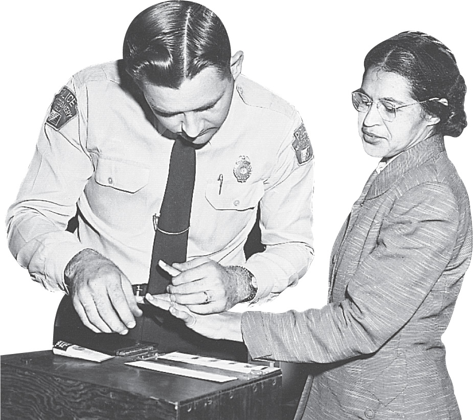 photo: A police officer takes the fingerprints of Rosa Parks.