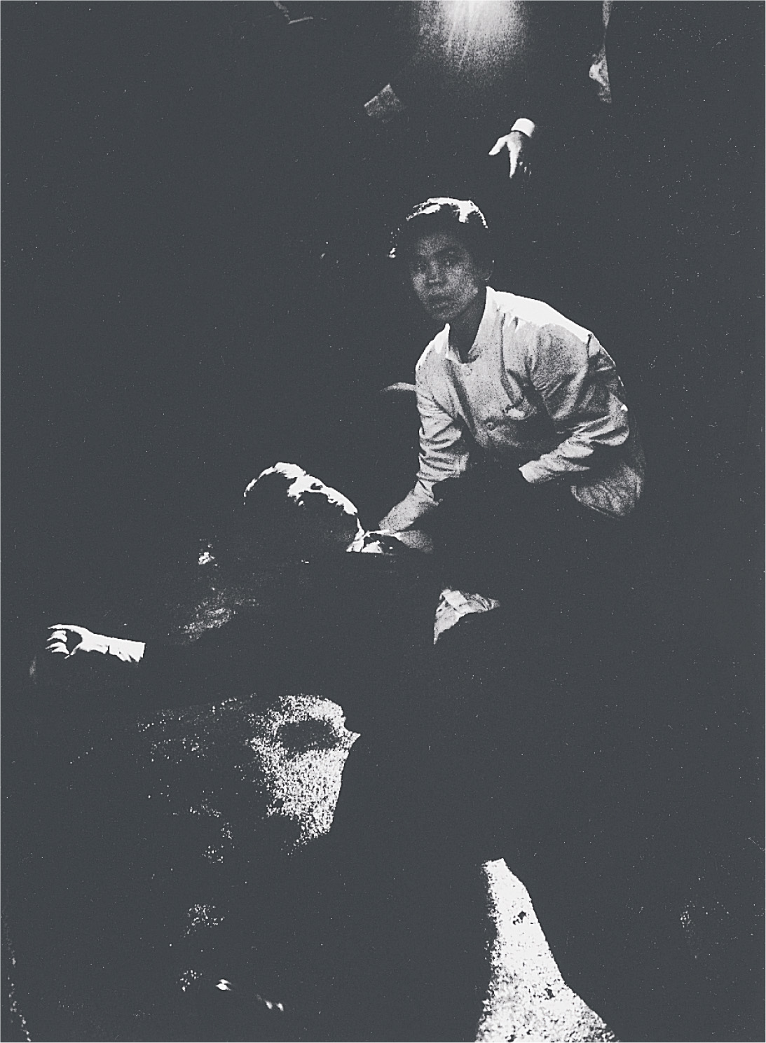 photo: a busboy kneels over the fallen Robert Kennedy.