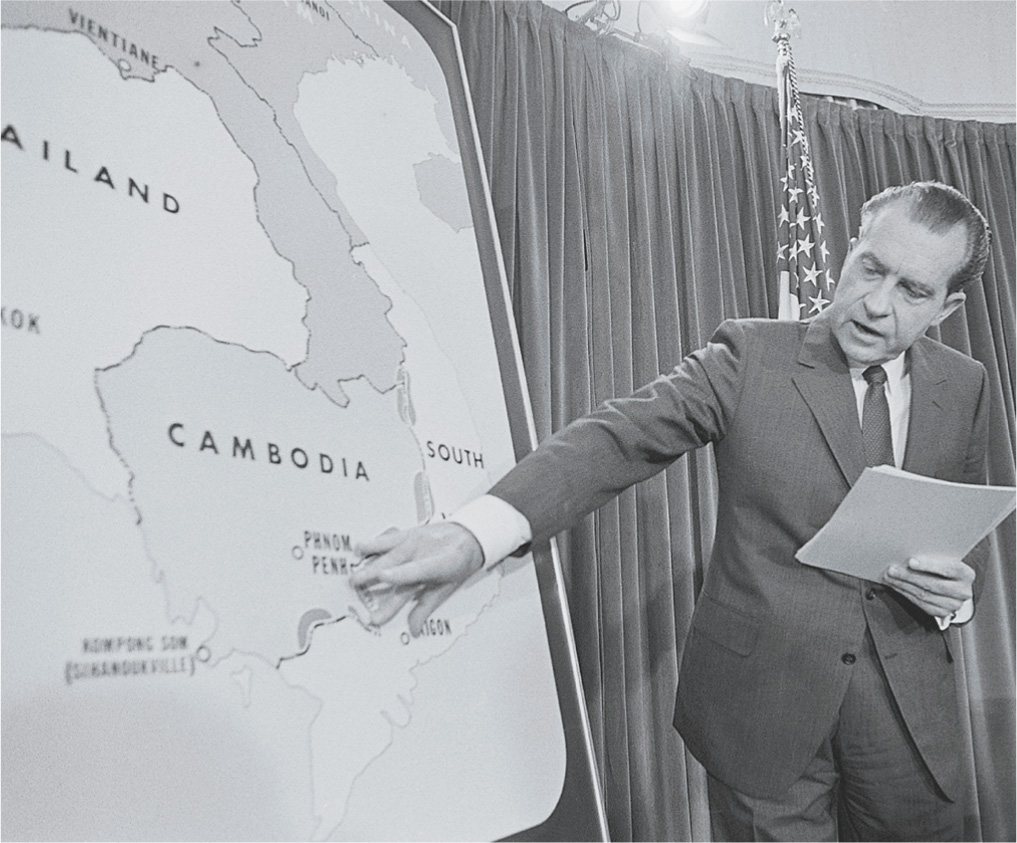 Photo: Nixon points to a map.