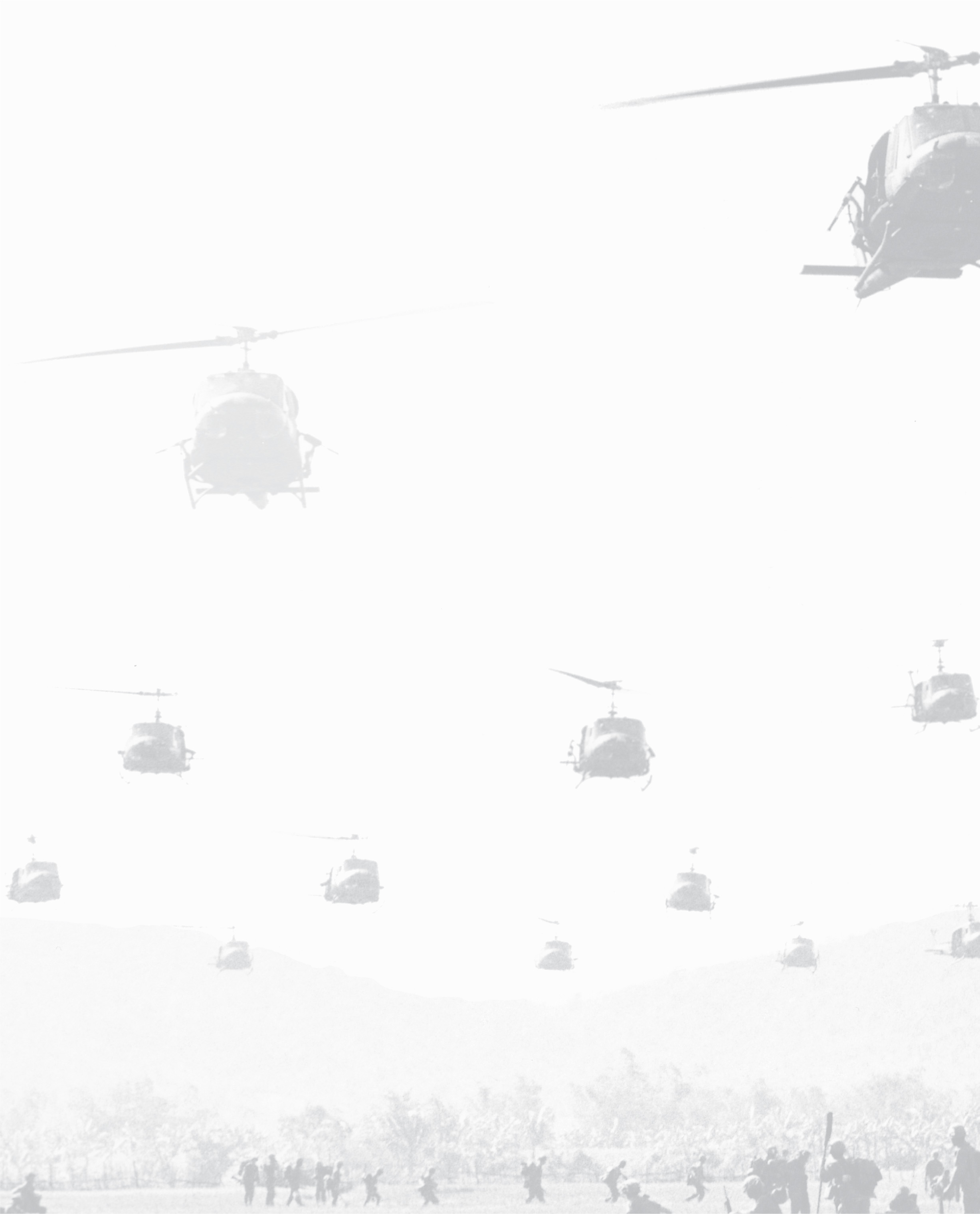 photos: dozens of helicopters fill the sky over soldiers walking across a field.