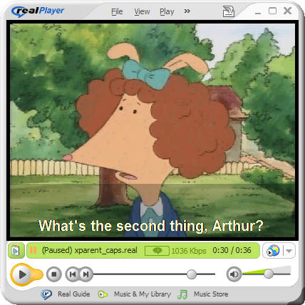 The RealPlayer showing translucent-background captions over the video region.